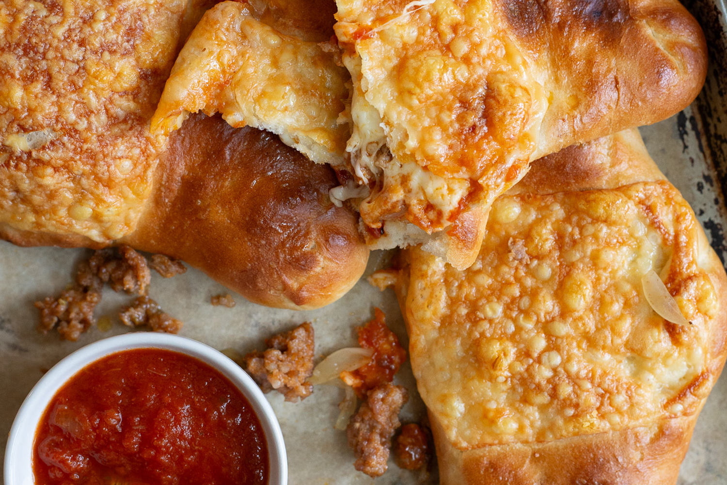 Caramelized Onion and Sausage Calzones