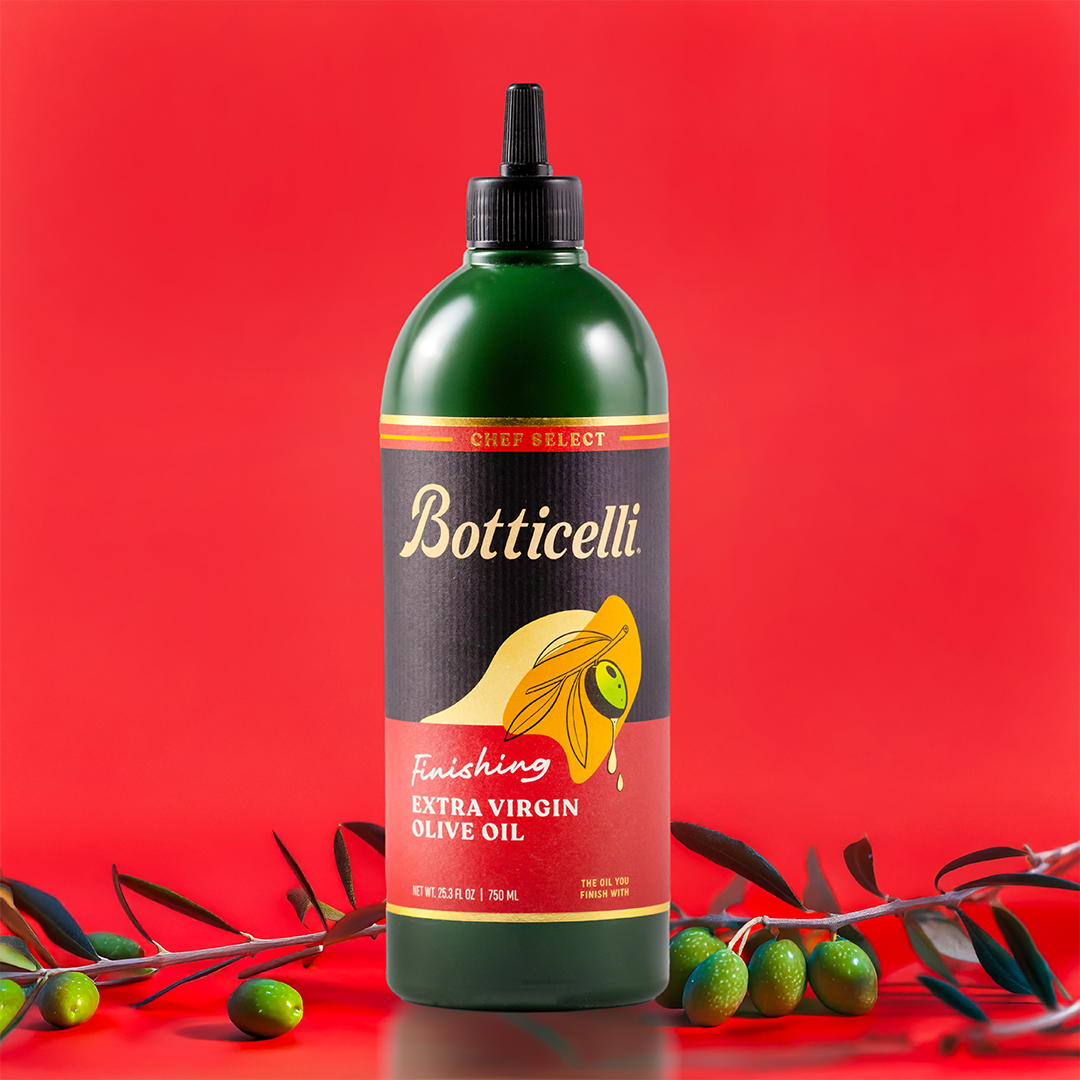 Botticelli Chef Select Finishing Extra Virgin Olive Oil packaging on a red background