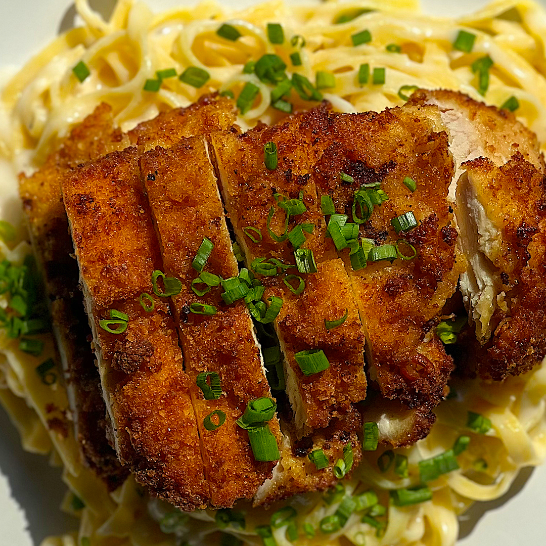 chicken cutlet over pasta