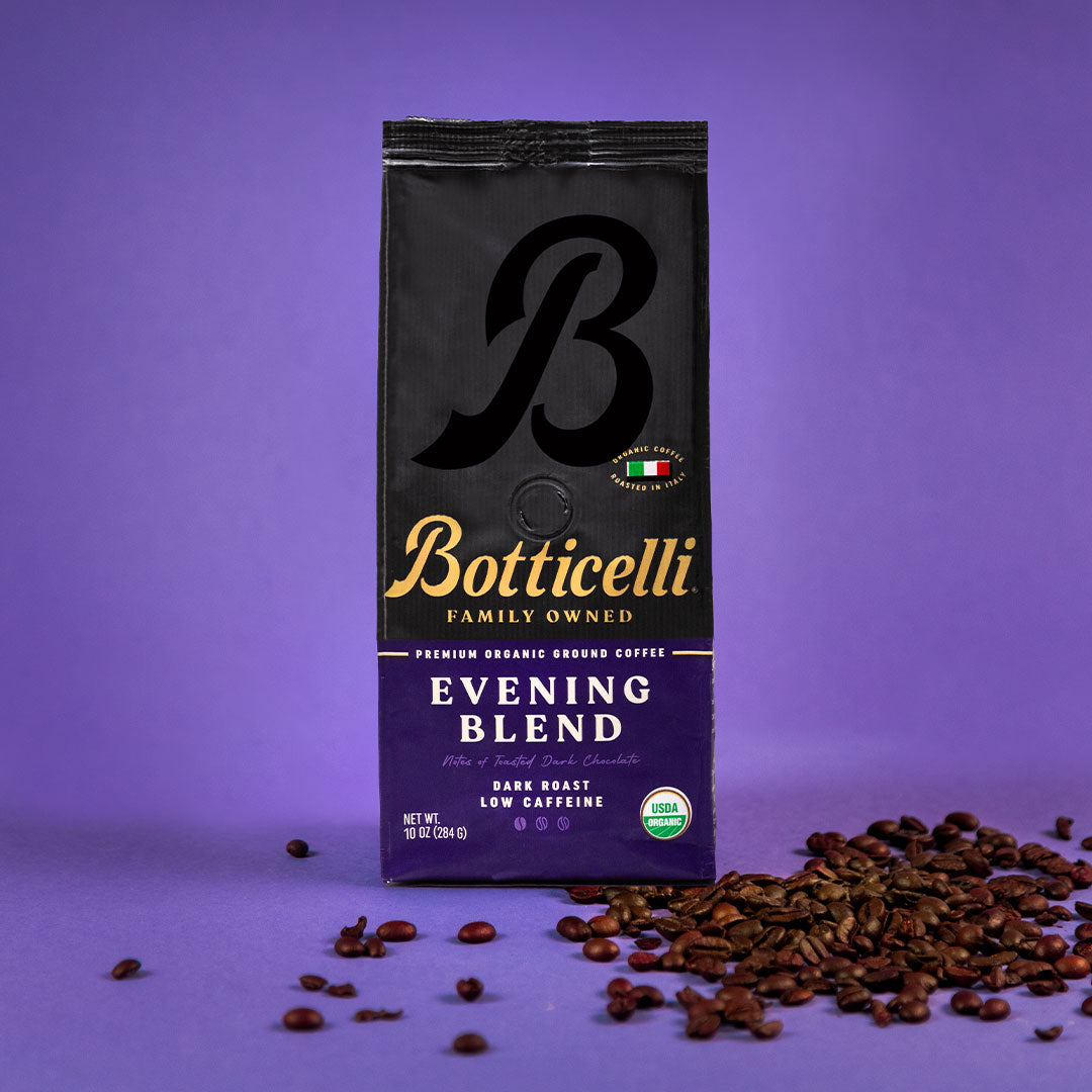 Botticelli Evening Blend coffee package with scattered coffee beans on a purple background