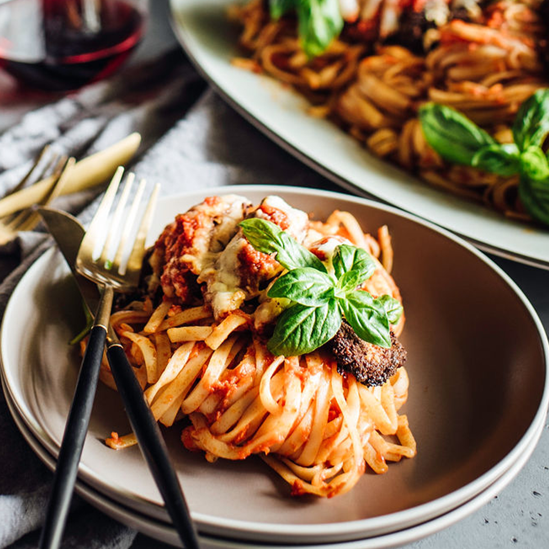 chicken parmesan over pasta