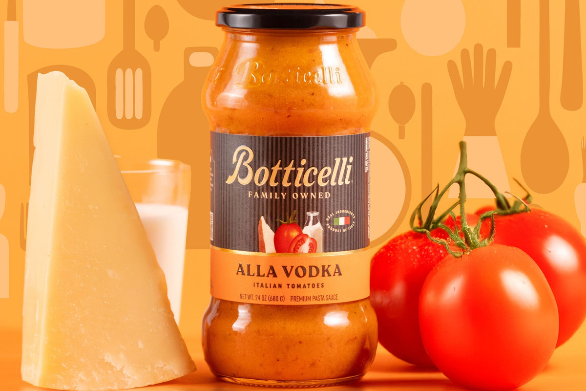 Alla Vodka Sauce with ingredients next to it