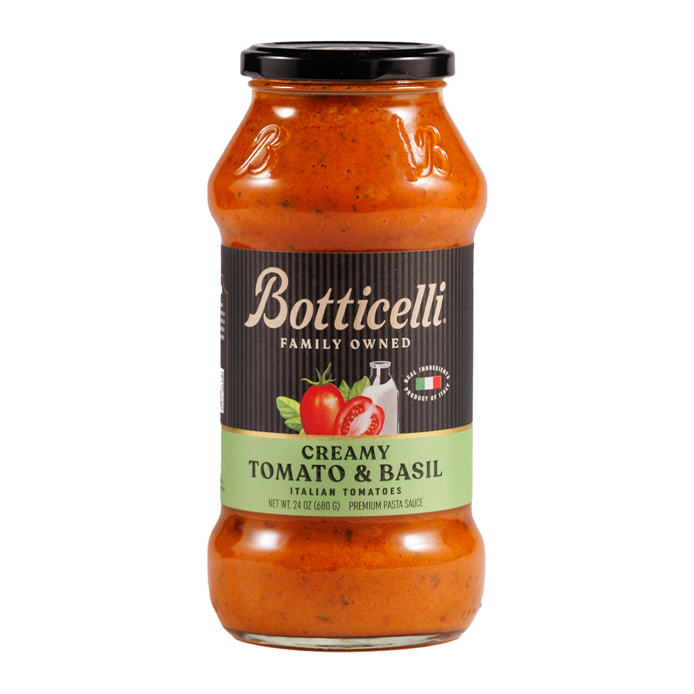 Botticelli creamy tomato & basil pasta sauce jar on a white background